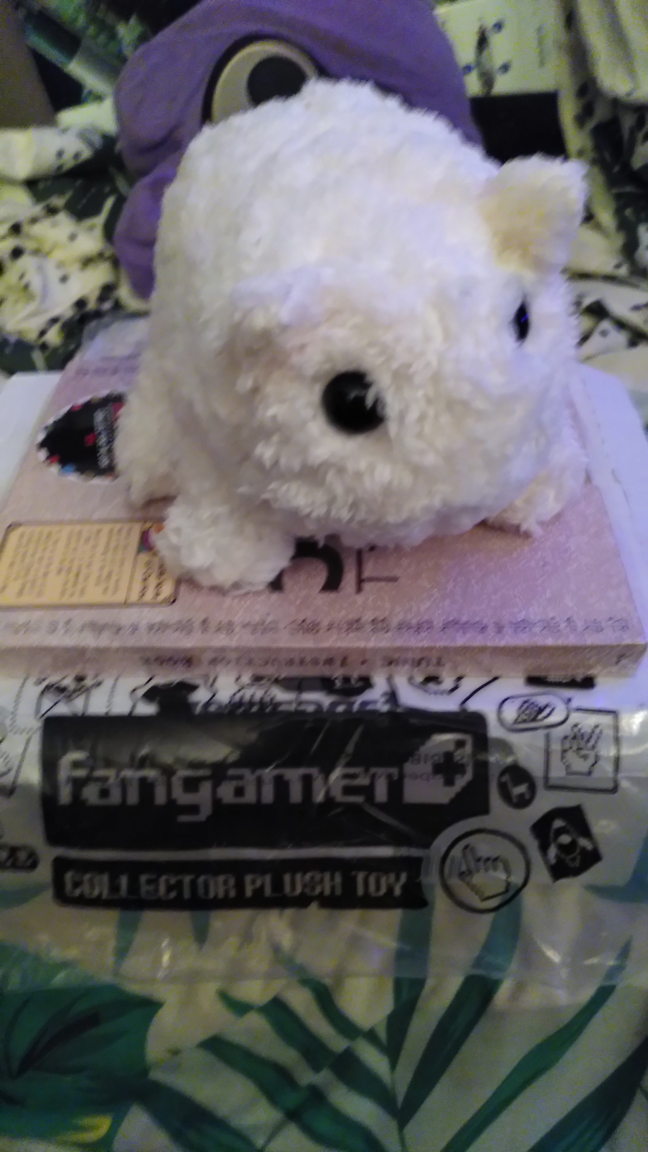 A baba plushie! It's on a tunic hardcover manual