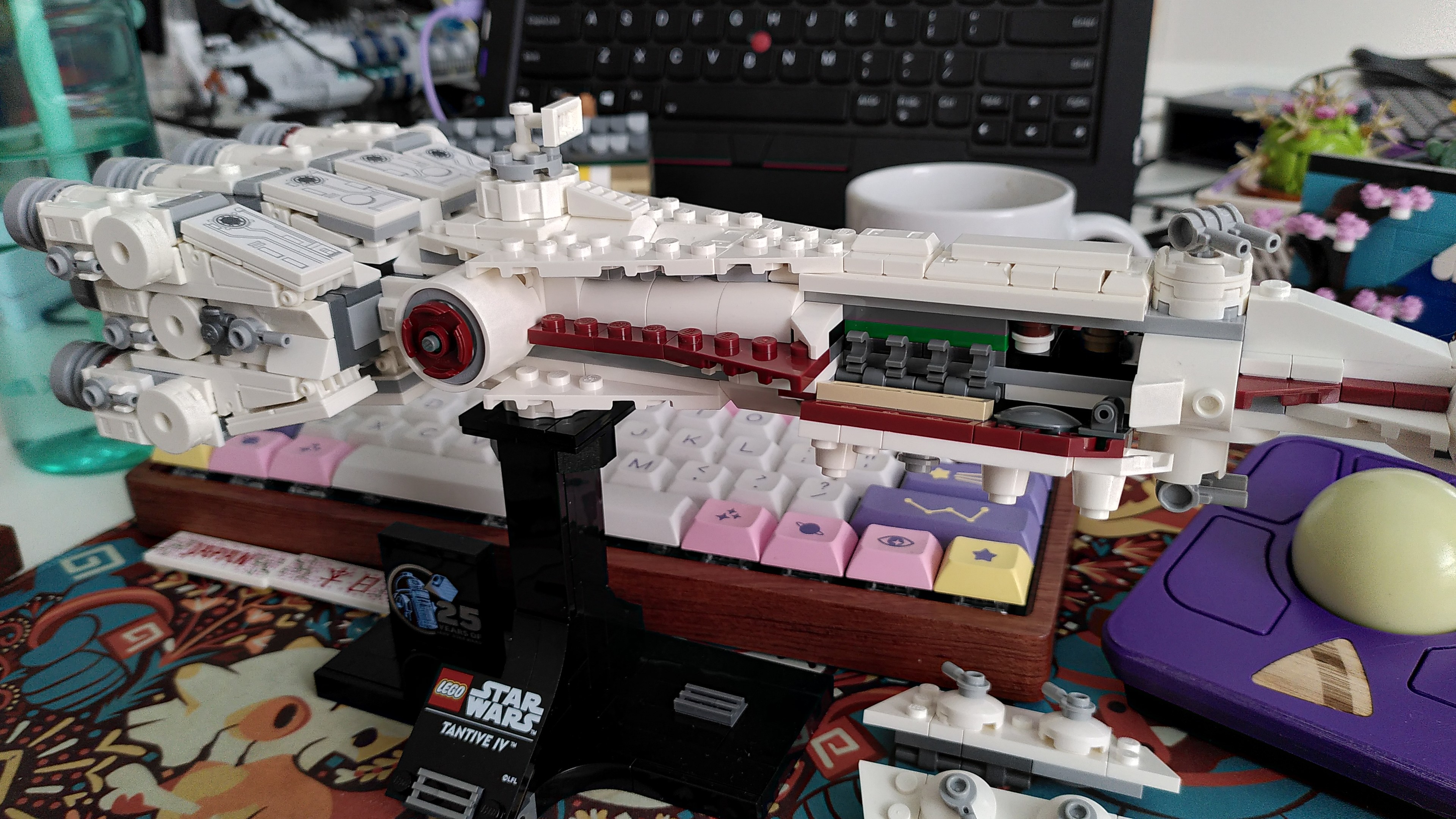 Lego tantive IV with a couple of panel removed to revel the scene where give the death star readout to R2D2