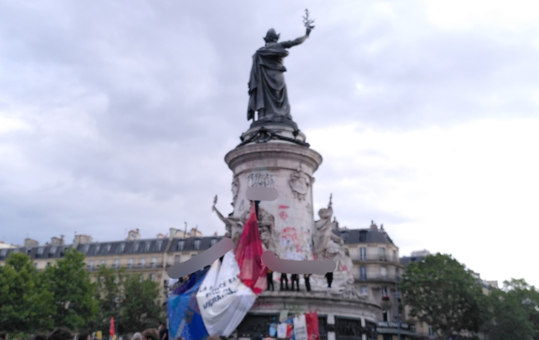The statue at the center of place de la republique in paris